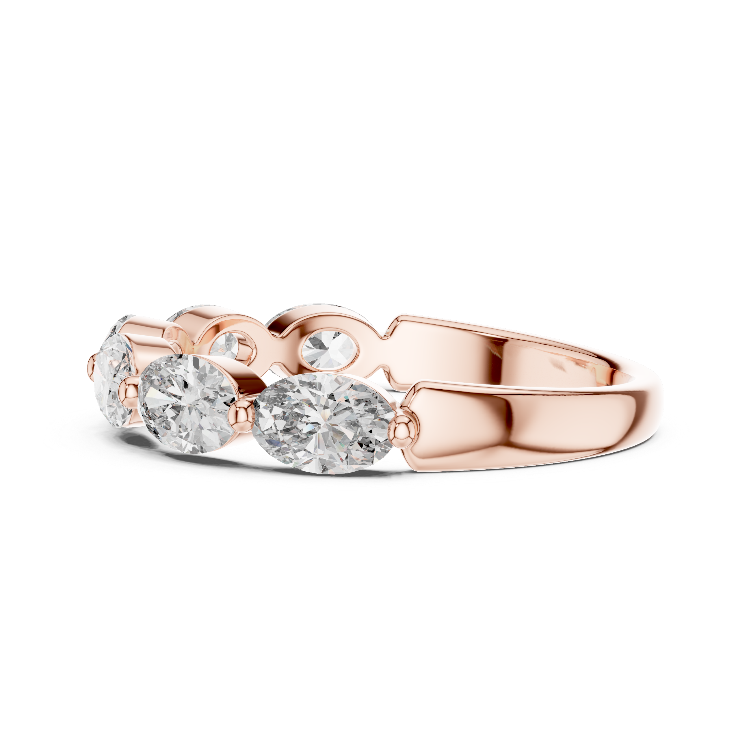 Rose gold ring with three clear gemstones on a white background